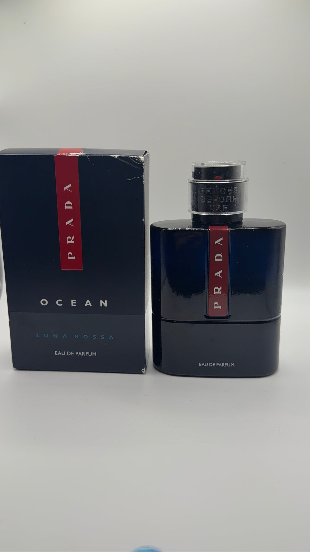 Prada Luna Rossa Ocean Eau de Parfum bottle and box - front view