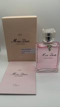 Miss Dior Rose Essence bottle, box and booklet - front view